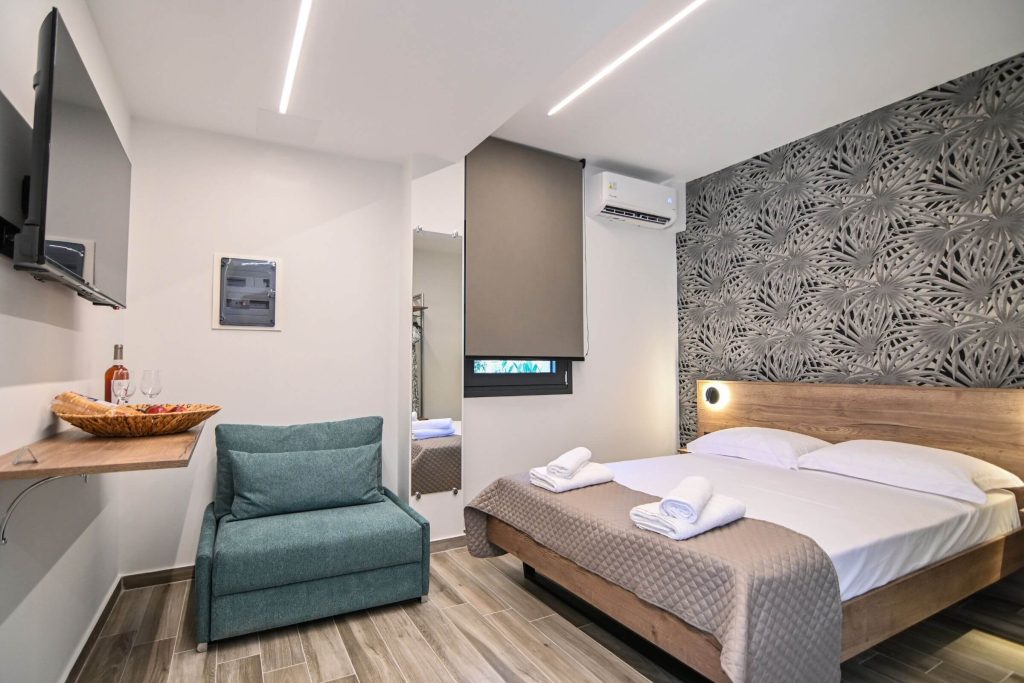 Esperides Suites | Erythia Suite | Double Bed | Sofa Bed | TV | Air Condition | Nea Vrasna