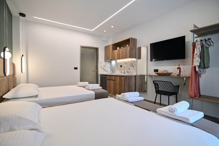 Esperides Suites | Estia Suite | Beds | TV | Kitchen | Nea Vrasna